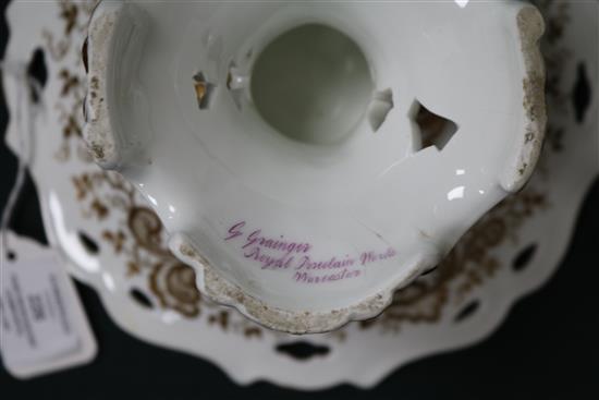 A rare pair of George Grainger & Co. Worcester topographical dessert comports, c.1846, firing fault to sky above tower, height 14cm